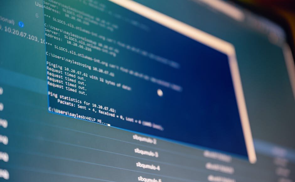 Close-up of digital data analysis displayed on a computer monitor with blue tones.